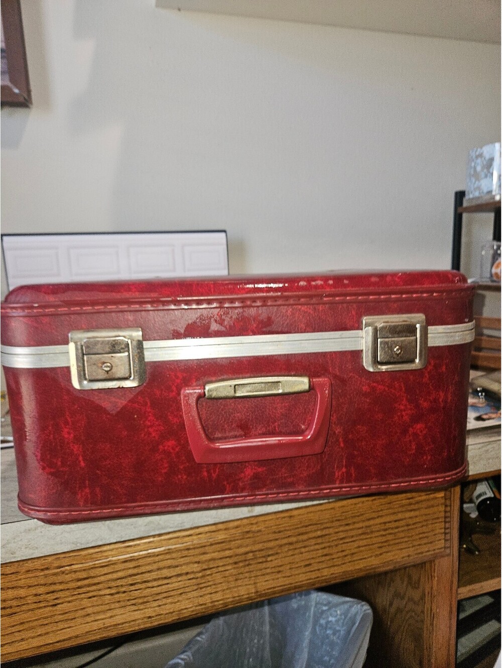 Vintage Red Hard-Shell Suitcase with Patterned Interior